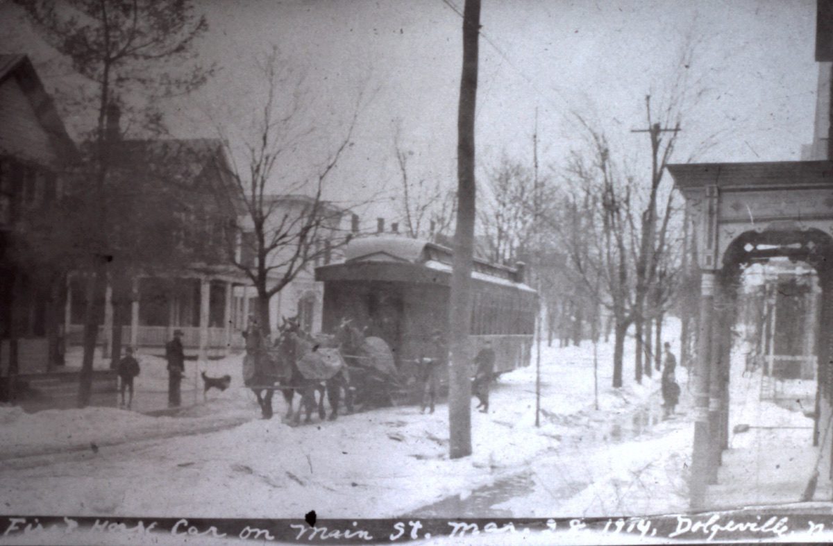 Circa 1914 | Street Car being pulled by horses on Main Street, Dolgeville, New York. Photo courtesy of the Little Falls Historical Society Museum.