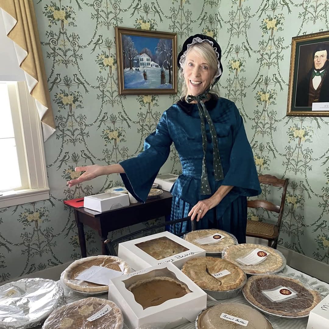 Carol Johnston working the Homemade Pie Sale at The Rice Homestead's Christmas Open House.